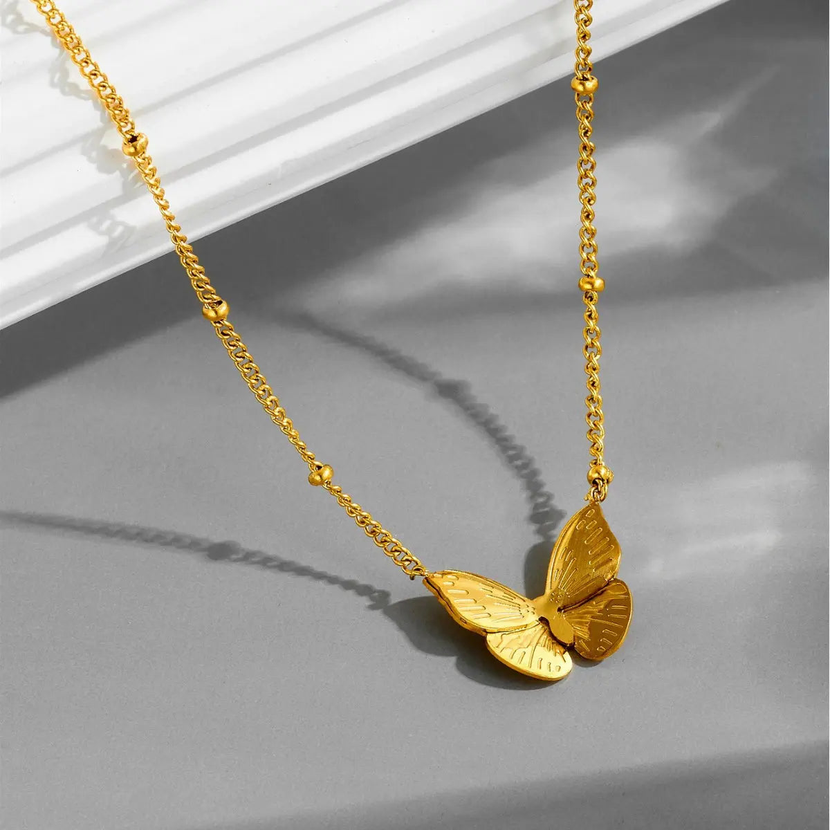 Golden Butterfly Glow Necklace & Earrings Set