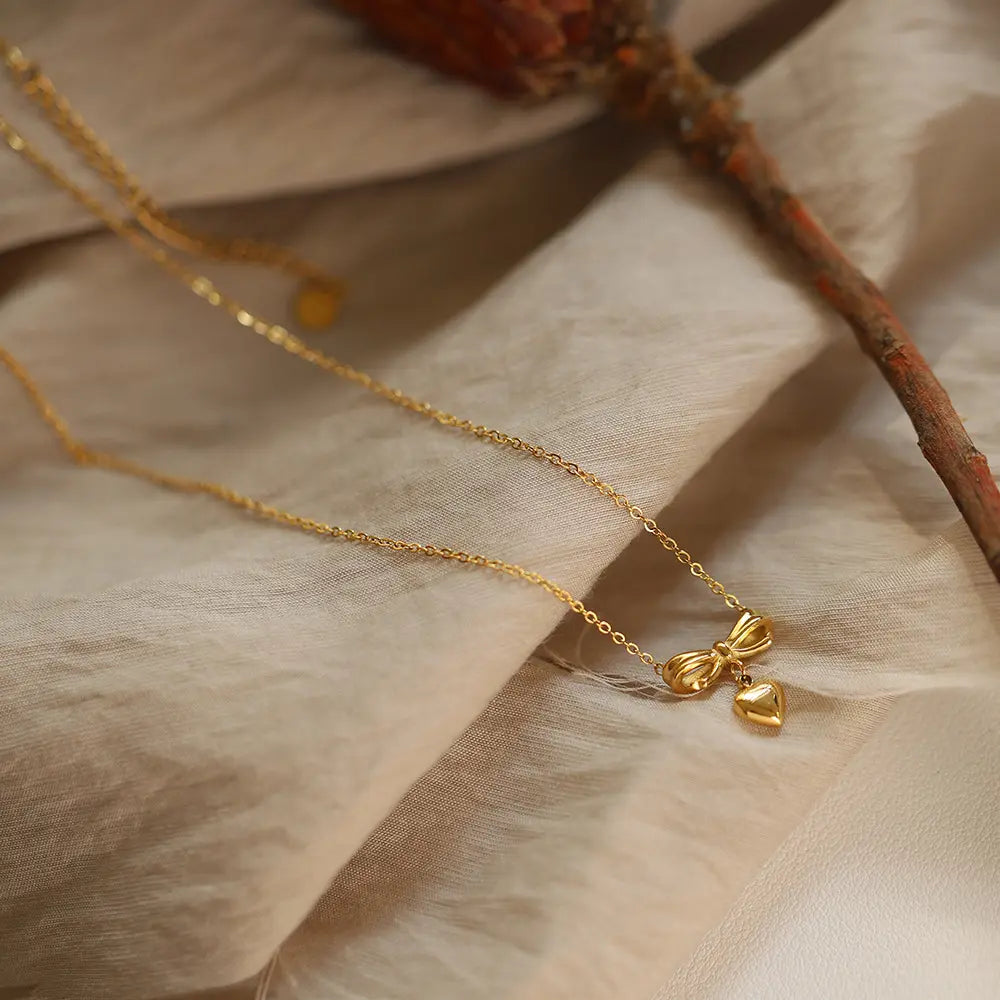 Golden Bow Heart Pendant Necklace