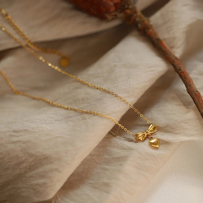 Golden Bow Heart Pendant Necklace