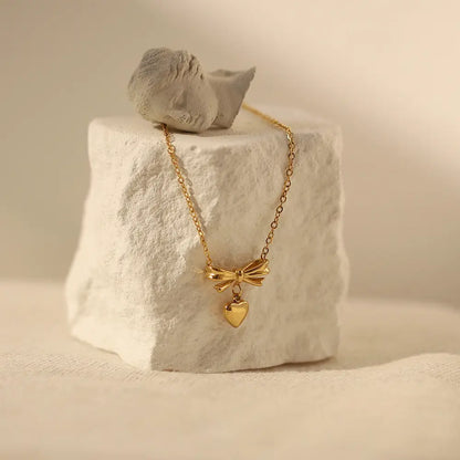 Golden Bow Heart Pendant Necklace