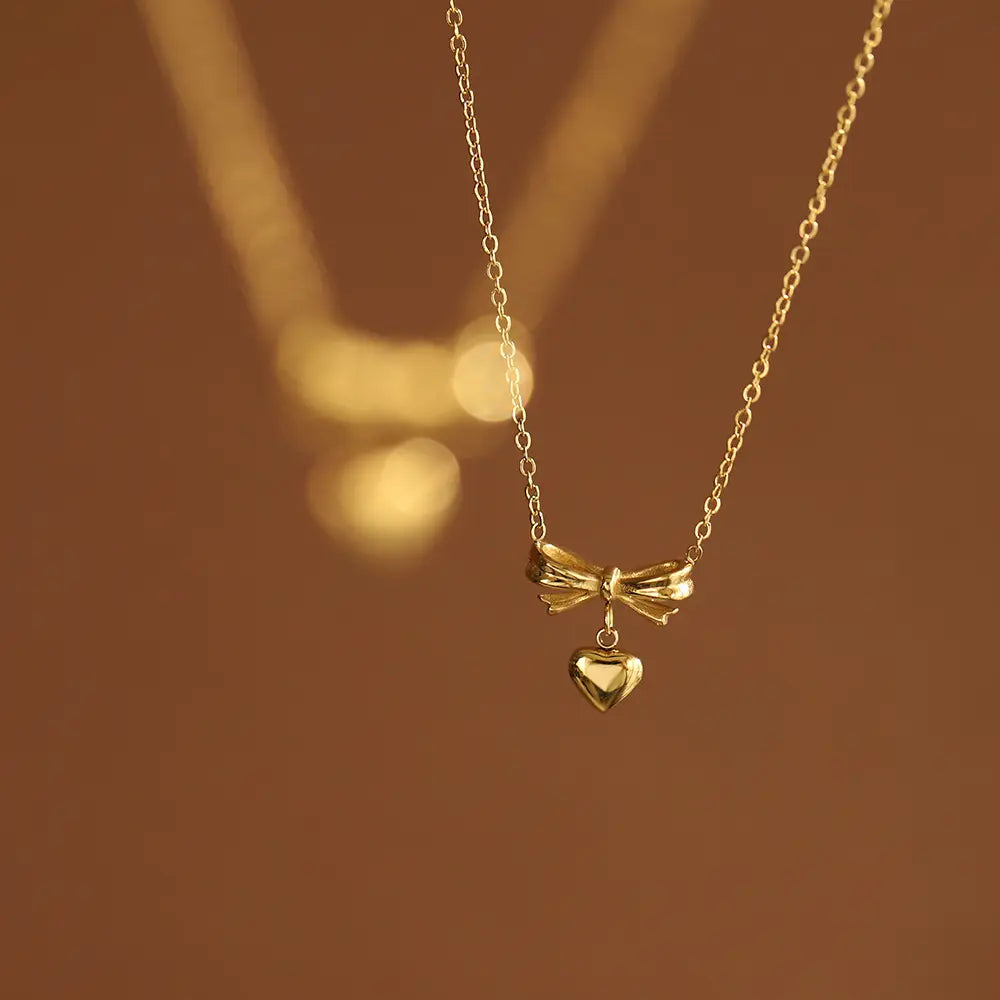 Golden Bow Heart Pendant Necklace